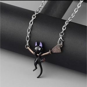 Silver & black titanium and black cat broom witchy necklace cat slides new